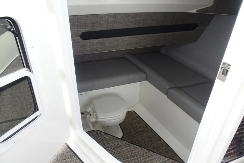 Slide: The Image of Interior cabin of 2022 Cobalt A29 boat with seating and toilet. - 26