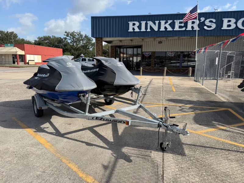 Slide: The Image of Two 2022 Yamaha WaveRunner FX Limited SVHO on a trailer outside a boat dealership. - 4