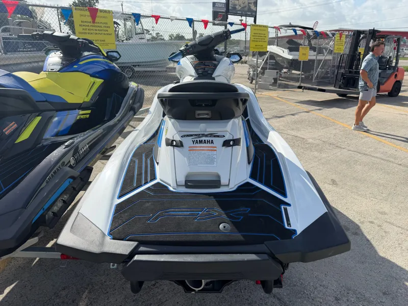 Slide: The Image of A 2022 Yamaha WaveRunner FX Limited SVHO is parked. It features a white body with black accents. - 8