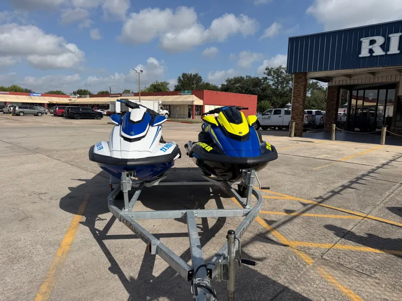 Slide: The Image of Two Yamaha WaveRunner FX Limited SVHO jet skis from 2022 on a trailer outdoors. - 2