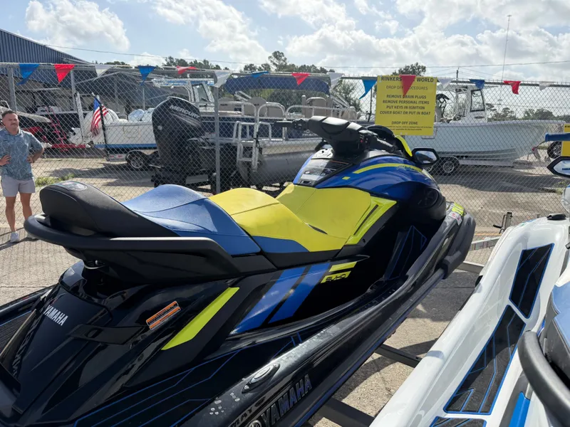 Slide: The Image of Yamaha WaveRunner FX Limited SVHO 2022 in a showroom with other boats in the background. - 14