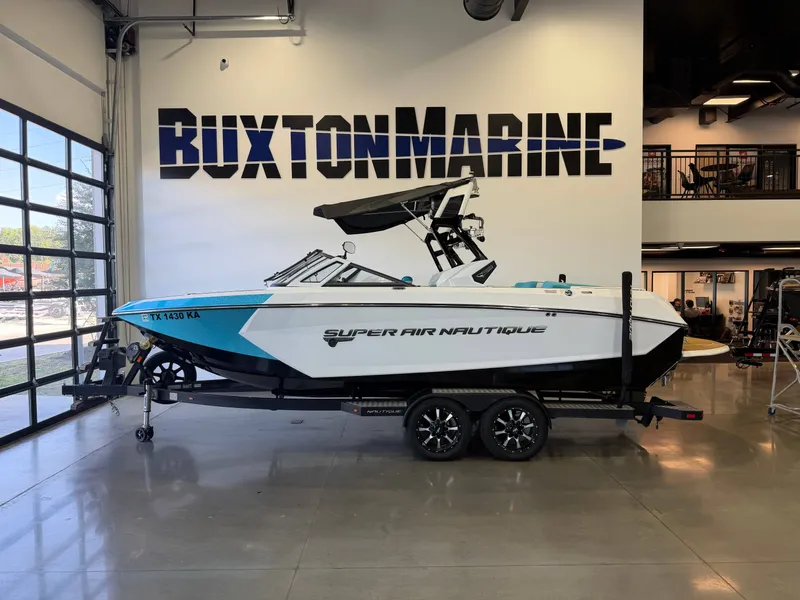 The Image of 2017 Nautique Super Air Nautique G23 in a showroom. - 1