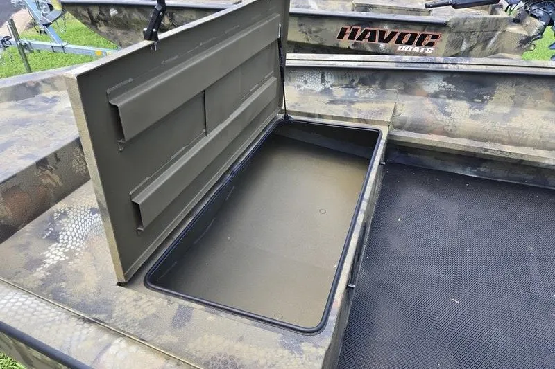 Slide: The Image of Open storage compartment in 2026 Havoc 1760 VJST boat, showcasing interior space. - 5