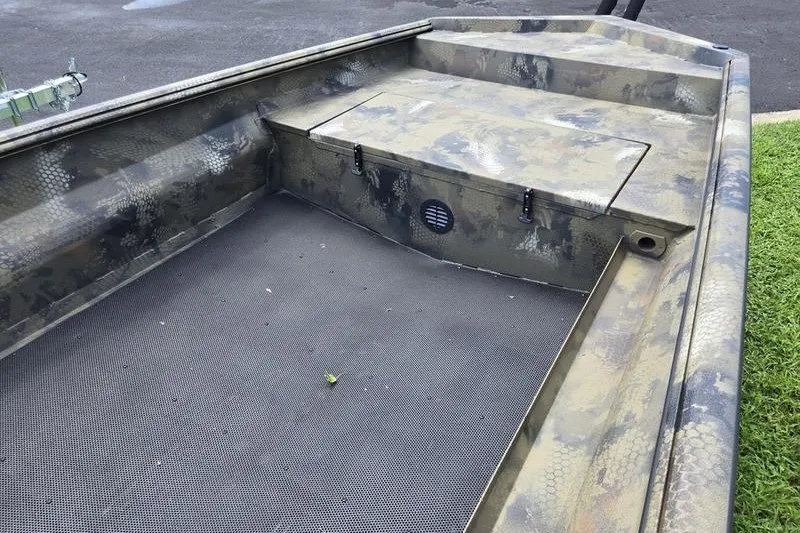Slide: The Image of 2026 Havoc 1760 VJST boat interior with camouflage design and storage compartment. - 6