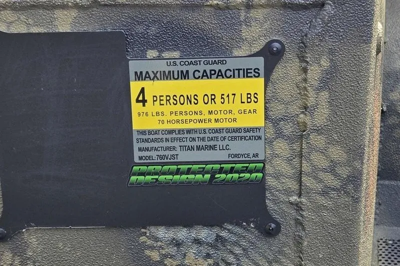 Slide: The Image of U.S. Coast Guard capacity label on 2026 Havoc 1760 VJST boat, 4 persons or 517 lbs. - 7