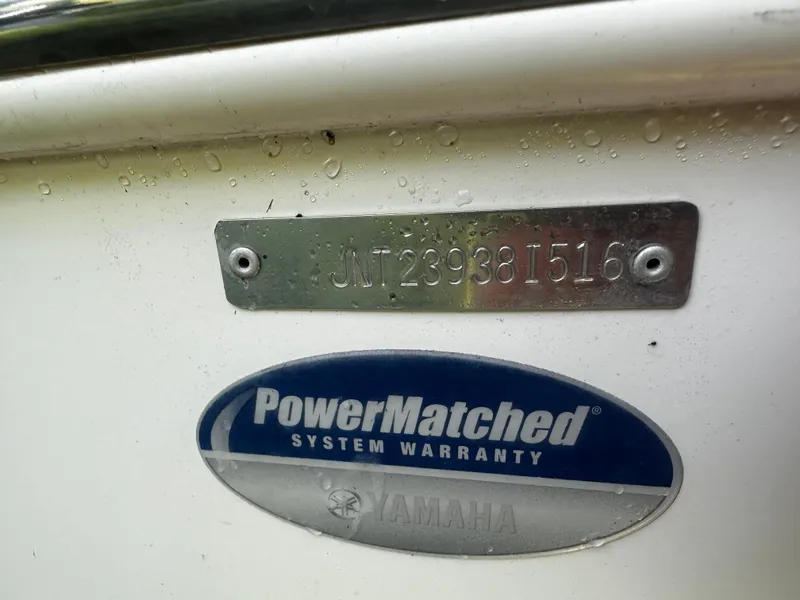 Slide: The Image of 2016 NauticStar 22 XS Offshore boat with Yamaha PowerMatched system warranty badge. - 9