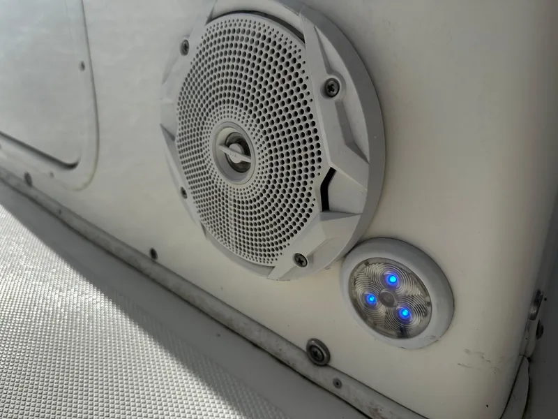 Slide: The Image of 2016 NauticStar 22 XS Offshore boat speaker and blue LED lights. - 35