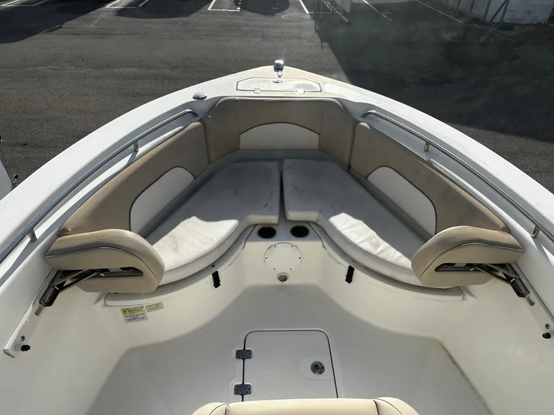 Slide: The Image of 2016 NauticStar 22 XS Offshore boat interior with cushioned seating. - 38