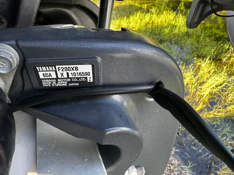Slide: The Image of Close-up of Yamaha F200XB engine on 2016 NauticStar 22 XS Offshore boat. - 8