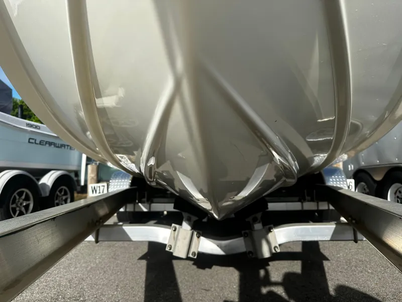 Slide: The Image of 2016 NauticStar 22 XS Offshore boat hull on trailer, close-up view. - 4