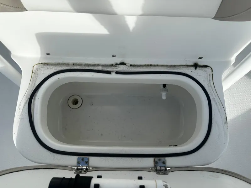 Slide: The Image of Open storage compartment on 2016 NauticStar 22 XS Offshore boat. - 40