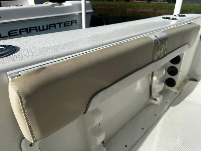 Slide: The Image of 2016 NauticStar 22 XS Offshore boat interior with cushioned seating. - 18