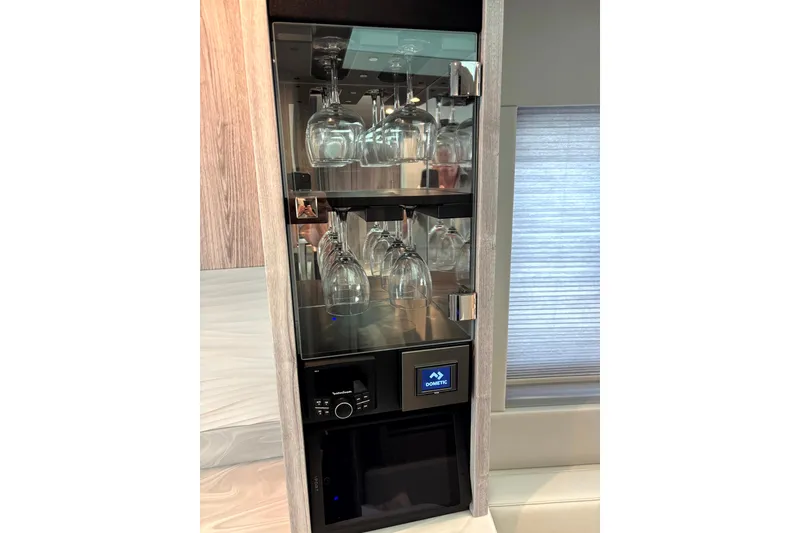 Slide: The Image of Luxury glassware cabinet in 2025 Formula 500 Super Sport Crossover yacht interior. - 32