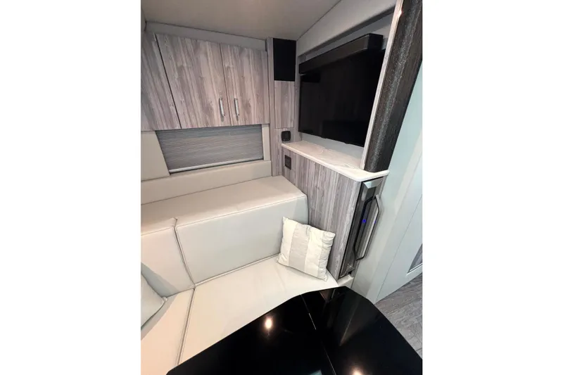 Slide: The Image of Interior of 2025 Formula 500 Super Sport Crossover with modern seating and cabinetry. - 29