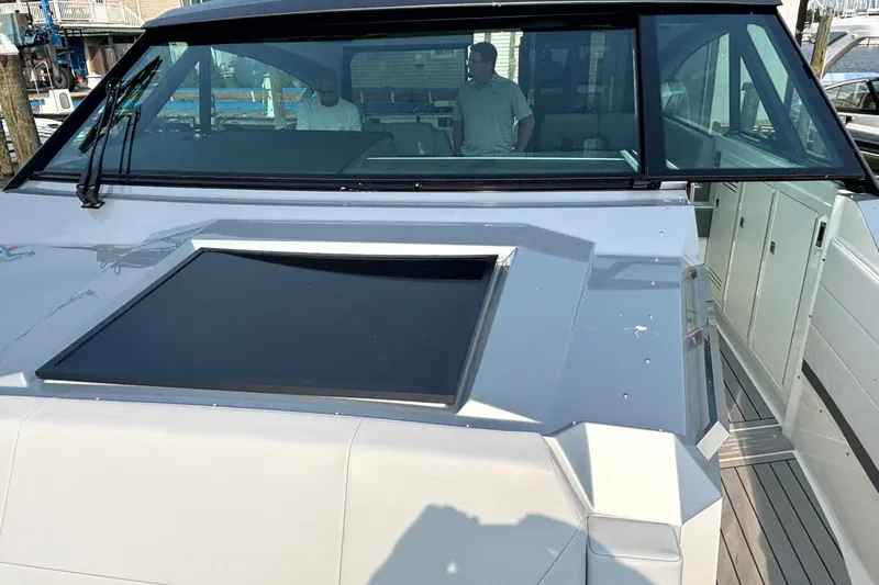 Slide: The Image of 2025 Formula 500 Super Sport Crossover yacht with sleek design and spacious deck. - 16