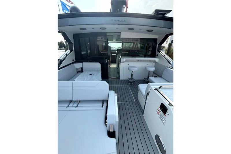 Slide: The Image of 2025 Formula 500 Super Sport Crossover yacht interior with sleek seating and modern design. - 20