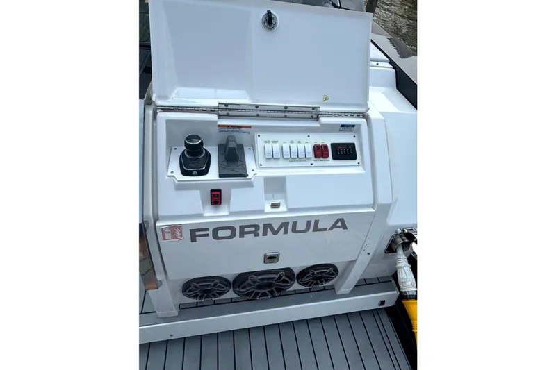 Slide: The Image of Control panel of 2025 Formula 500 Super Sport Crossover boat, featuring advanced navigation controls. - 19