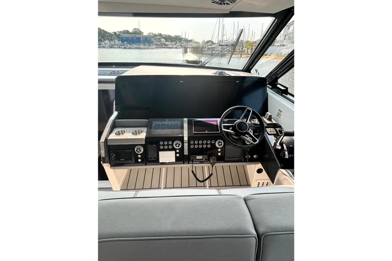 Slide: The Image of Helm of 2025 Formula 500 Super Sport Crossover with modern controls and sleek design. - 17