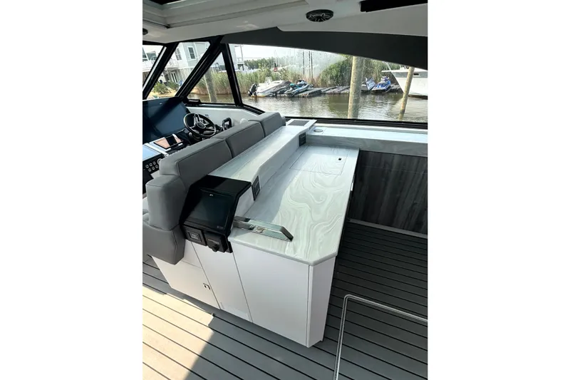 Slide: The Image of Interior of 2025 Formula 500 Super Sport Crossover boat with sleek seating and modern design. - 23
