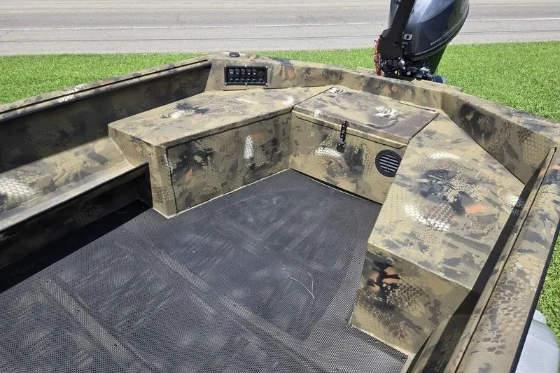 Slide: The Image of Camouflage interior of 2026 Havoc 1553 VJST boat with storage compartments. - 10