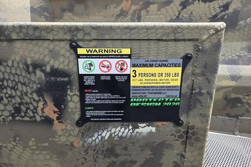 Slide: The Image of Warning label on Havoc 1553 VJST boat, 2026 model, showing capacity and safety instructions. - 7