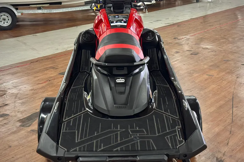 Slide: The Image of 2024 Yamaha WaveRunner VX Limited, red and black, displayed indoors on wooden floor. - 4