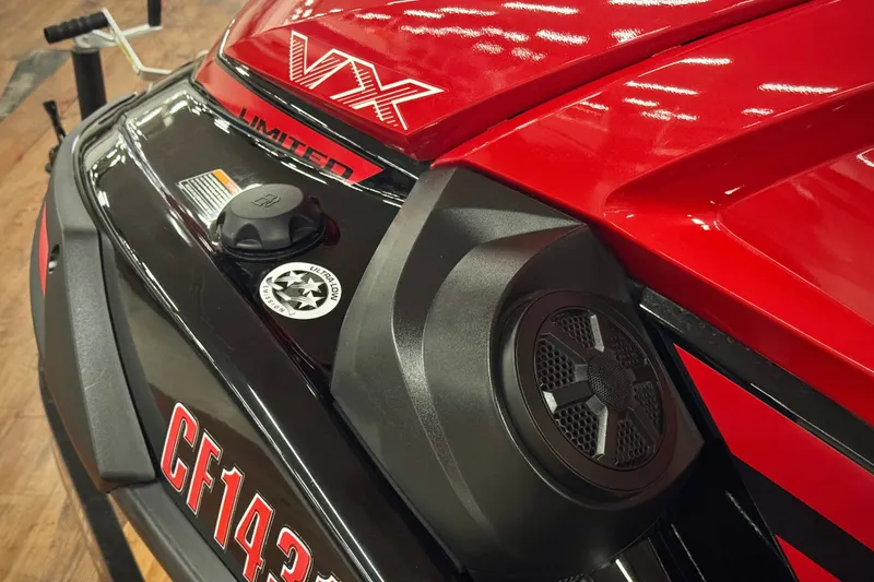Slide: The Image of 2024 Yamaha WaveRunner VX Limited, red and black design, close-up of rear speaker and fuel cap. - 6