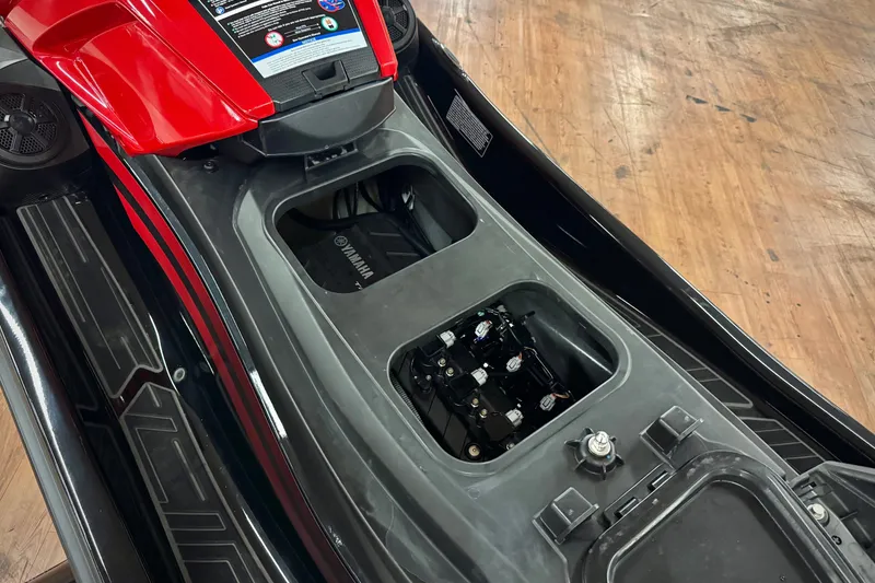 Slide: The Image of 2024 Yamaha WaveRunner VX Limited interior view, showcasing storage compartments and engine components. - 13