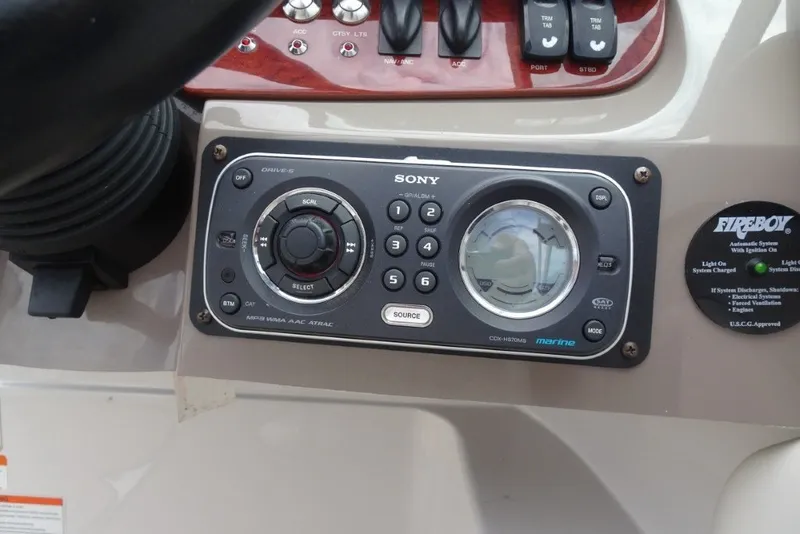 Slide: The Image of Sony marine stereo system on 2008 Four Winns H260 boat dashboard. - 18