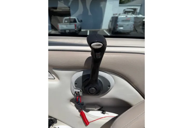 Slide: The Image of Throttle control lever on a 2003 Sea Ray 240 Sundeck boat. - 17
