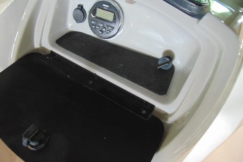 Slide: The Image of Dashboard of 2016 Chaparral 19 H2O Sport boat with control panel. - 12