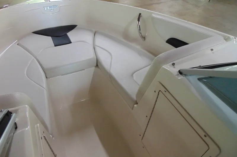 Slide: The Image of Interior view of 2016 Chaparral 19 H2O Sport boat seating area. - 15