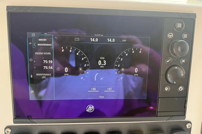 Slide: The Image of Dashboard display of a 2024 MJM Yachts MJM 3 showing engine hours and voltage. - 28