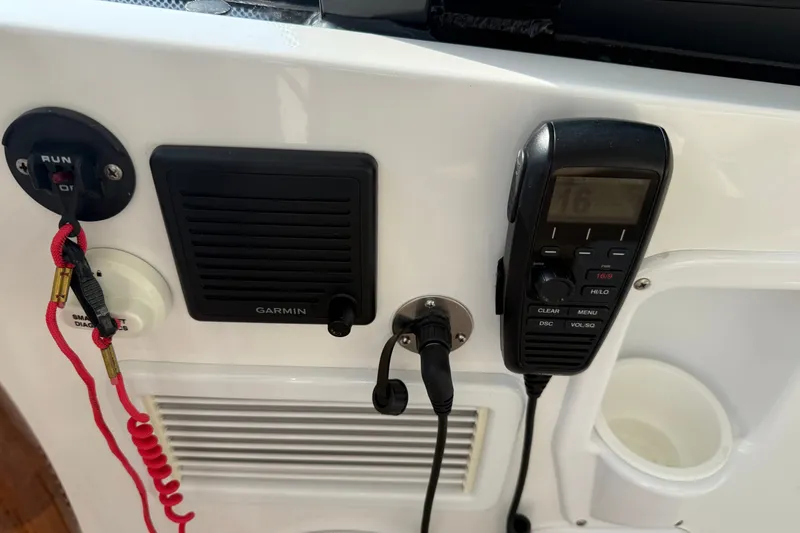 Slide: The Image of Control panel of 2024 MJM Yachts MJM 3 with Garmin speaker and radio. - 27