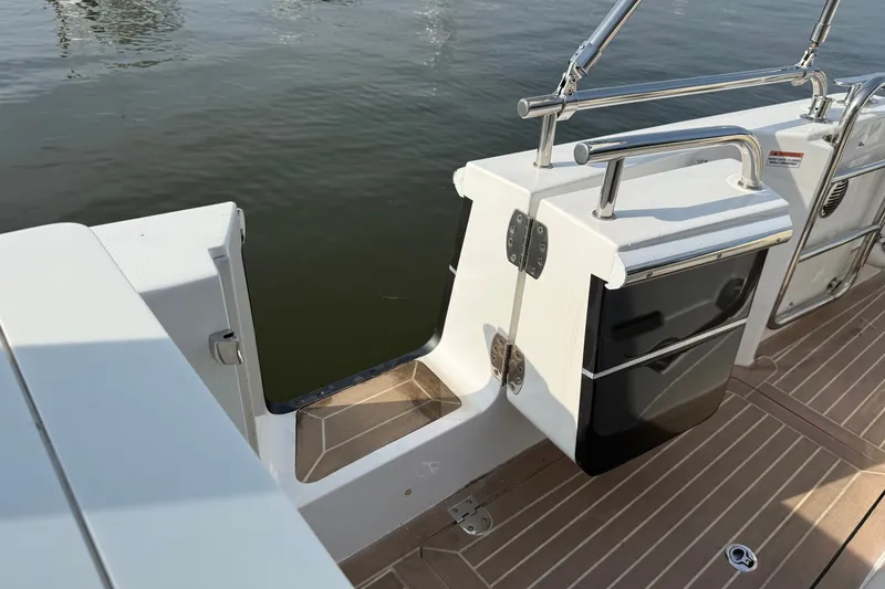 Slide: The Image of 2024 MJM Yachts MJM 3 swim platform with stainless steel railing and teak decking. - 16