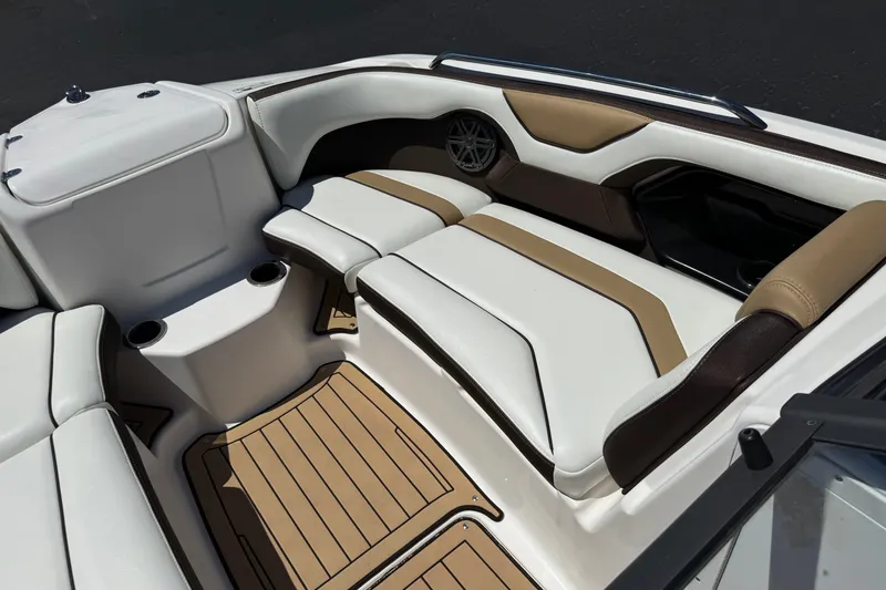 Slide: The Image of Luxurious interior of 2022 Yamaha Boats 212S with sleek seating and modern design. - 16
