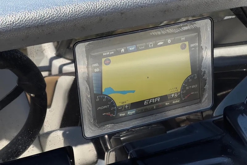 Slide: The Image of Dashboard of a 2022 Yamaha Boats 212S showing navigation and fuel data. - 26