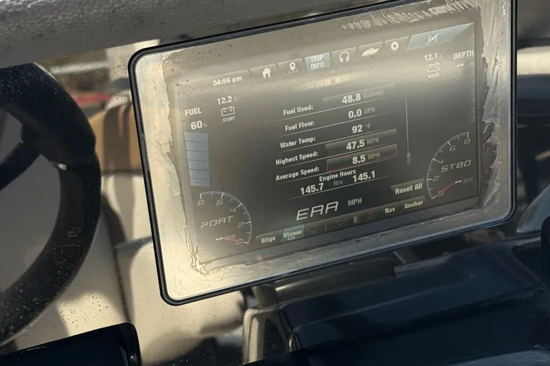 Slide: The Image of Dashboard display of a 2022 Yamaha Boats 212S showing fuel and speed metrics. - 27