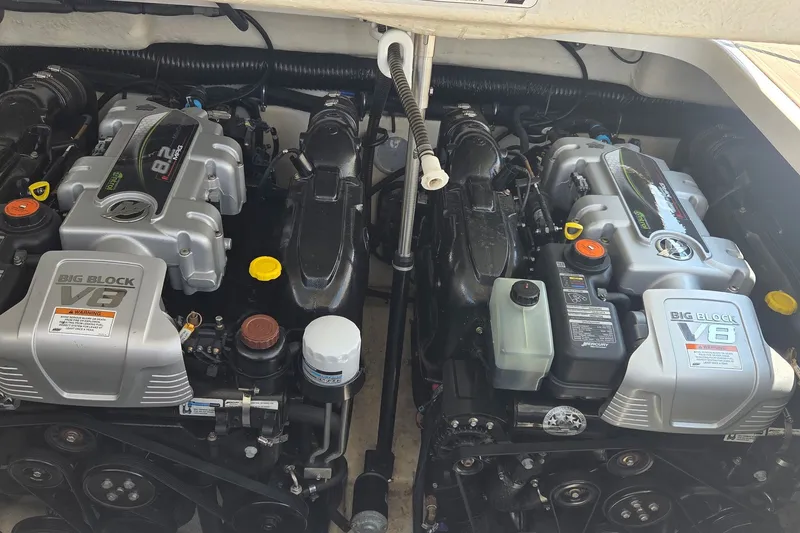 Slide: The Image of Twin V8 engines in a 2016 Formula 350 Crossover Bowrider I/O boat. - 14