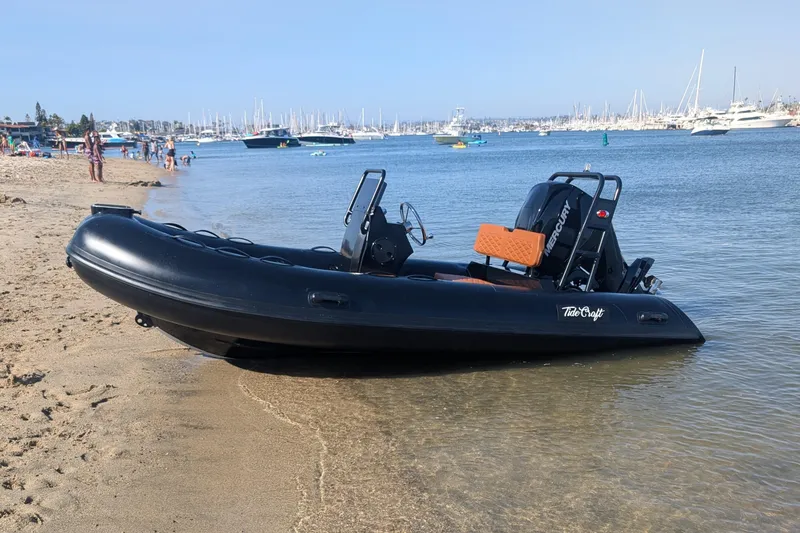 The Image of 2025 Tide Craft Custom Catalina 13 boat on sandy beach, with people and yachts in background. - 0