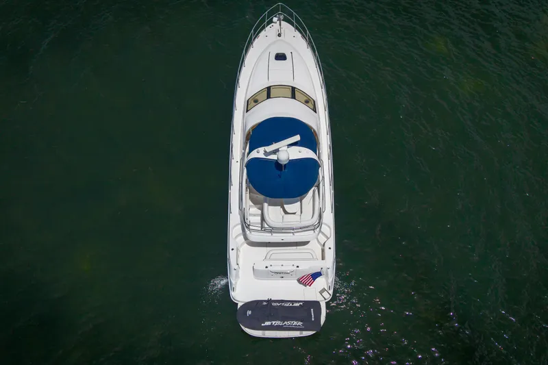 Slide: The Image of Aerial view of 2006 Sea Ray 44 Sedan Bridge yacht on water. - 8