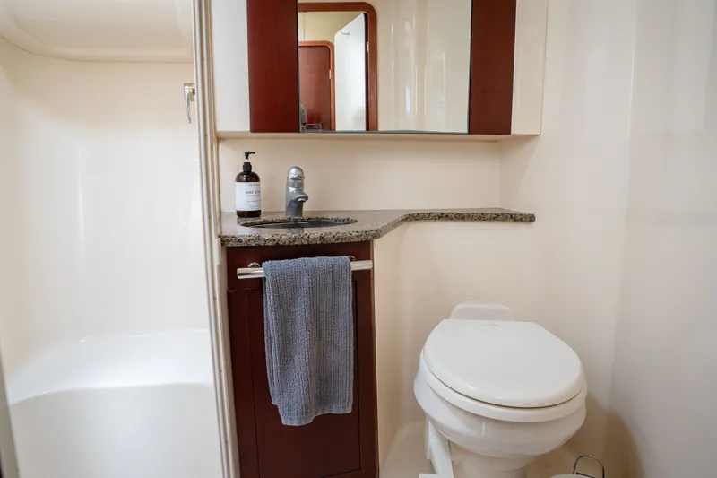 Slide: The Image of Luxurious bathroom in 2006 Sea Ray 44 Sedan Bridge yacht with modern fixtures. - 37