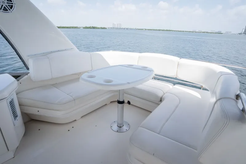 Slide: The Image of Luxurious seating area on 2006 Sea Ray 44 Sedan Bridge yacht with ocean view. - 23