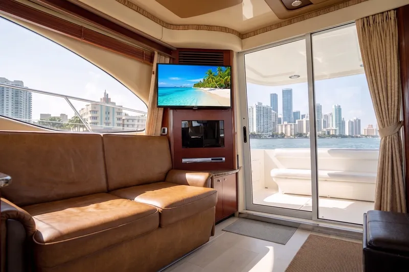 Slide: The Image of Luxurious interior of 2006 Sea Ray 44 Sedan Bridge yacht with city skyline view. - 27