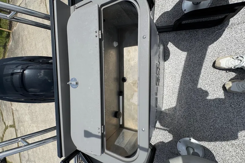 Slide: The Image of 2023 Angler Qwest 8522 All Sport Gen II Triple Tube boat interior storage compartment. - 20