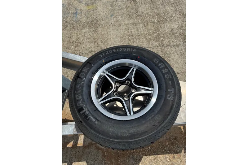 Slide: The Image of 2023 Angler Qwest 8522 All Sport Gen II Triple Tube tire, Gladiator QR25-TS, ST205/75R14. - 23