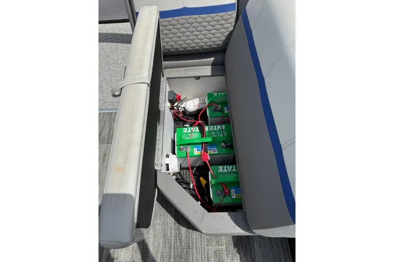 Slide: The Image of 2023 Angler Qwest 8522 All Sport Gen II Triple Tube boat battery compartment. - 16