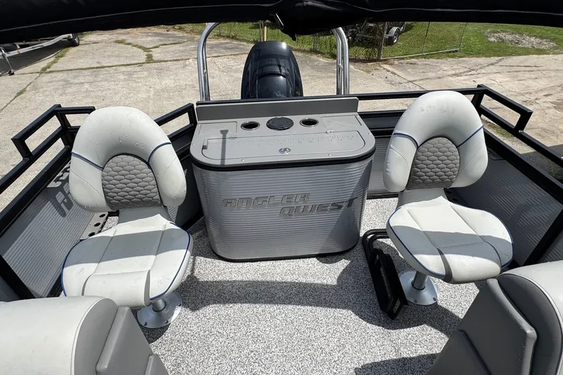 Slide: The Image of 2023 Angler Qwest 8522 All Sport Gen II Triple Tube interior with seating and console. - 19