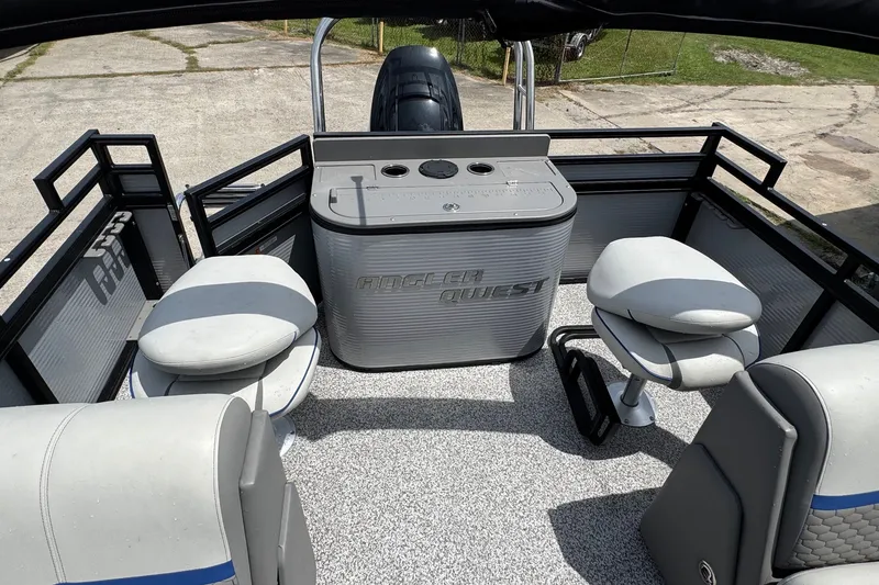 Slide: The Image of 2023 Angler Qwest 8522 All Sport Gen II Triple Tube boat interior with seating and console. - 18