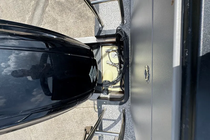 Slide: The Image of 2023 Angler Qwest 8522 All Sport Gen II Triple Tube boat engine and control panel. - 21